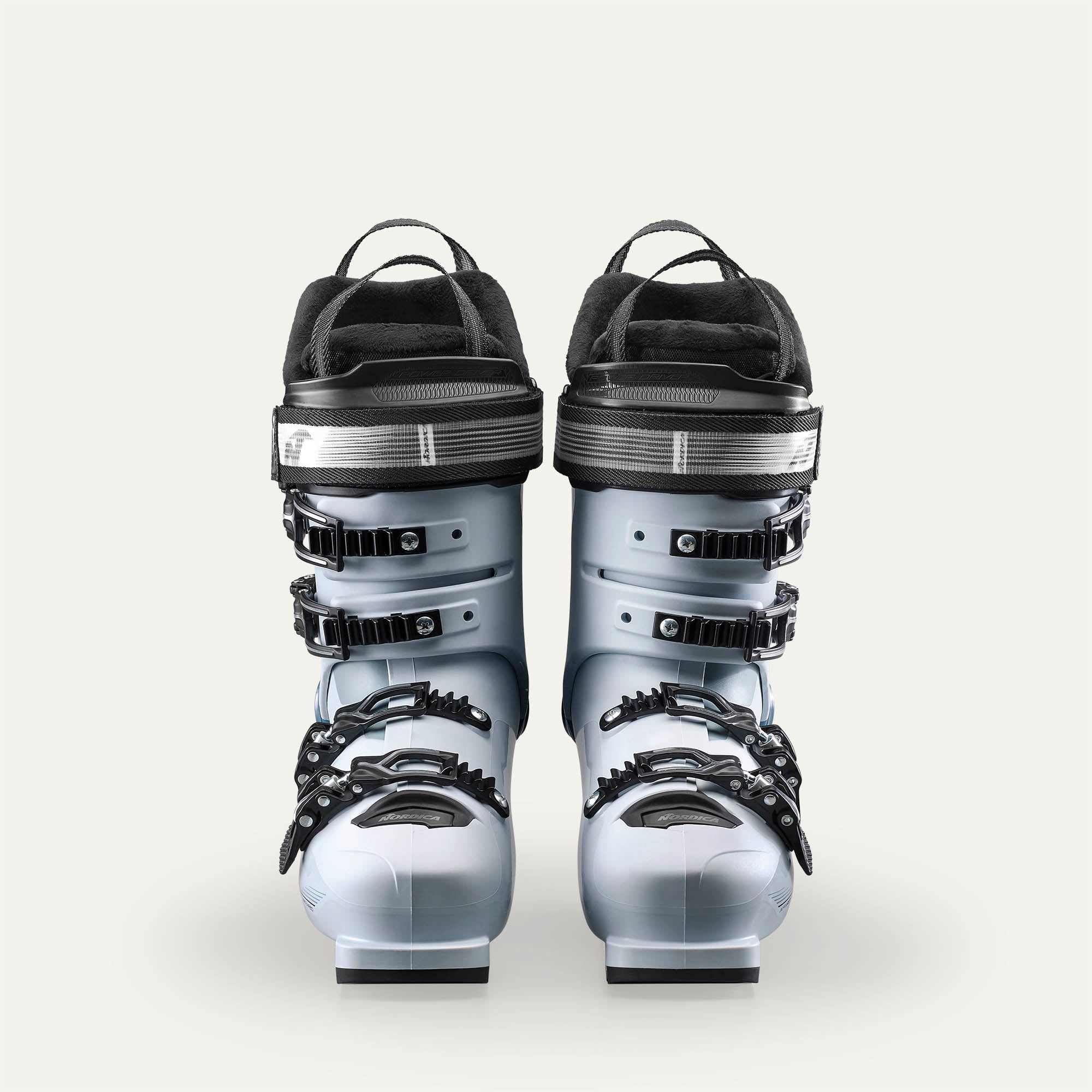 The lower shell and the upper cuff when viewing from the front is all ehite except the buckles that are black