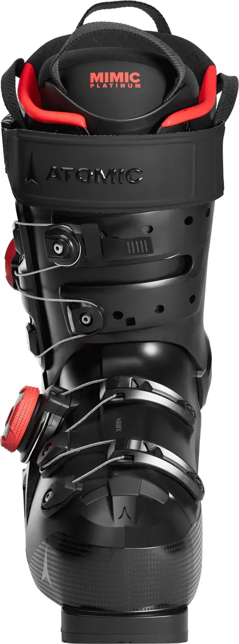Front view of a black men's ski boot with red accents and 'Atomic' branding on a white background