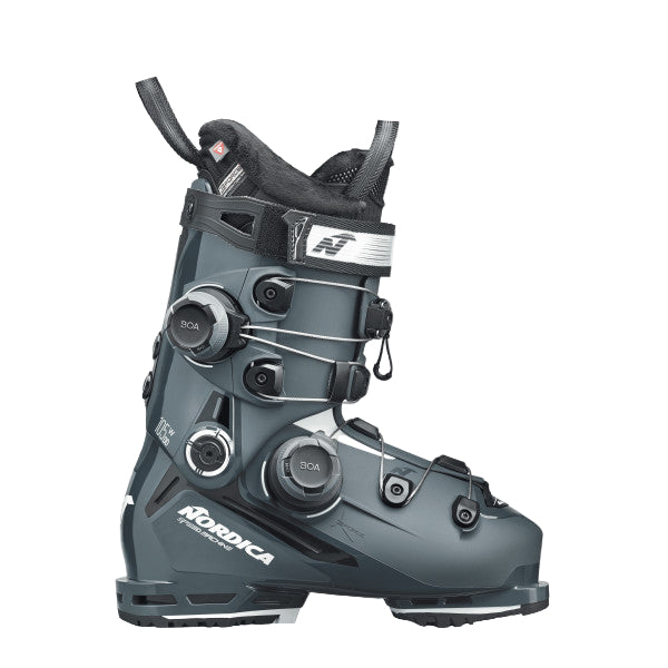 a dark greyish blue ski boot with dual BOA systems, one on the top cuff and one on the lower cuff.