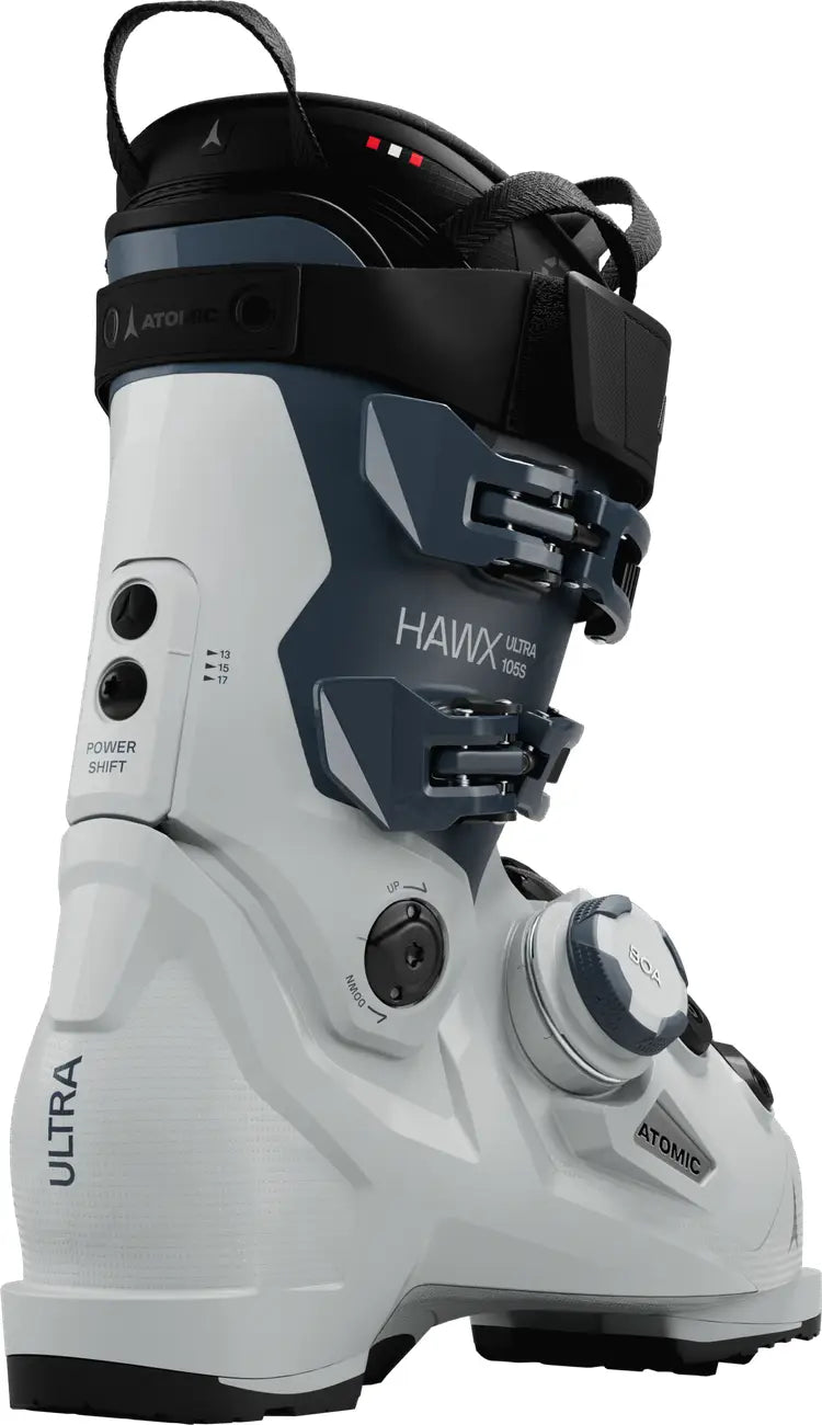 White and black ski boot with 'Atomic' branding on a white background