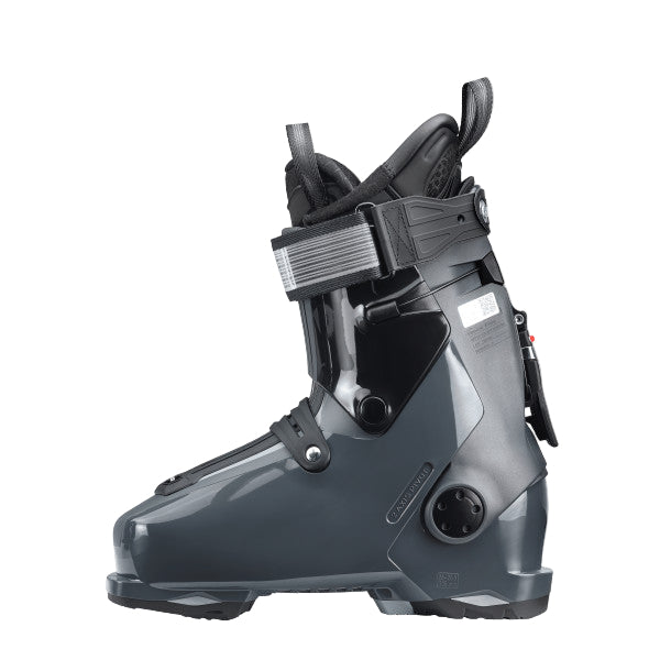 The inner of the boot is a dark grey, it is shiny. there is a hinge screw that connects the upper and lower.
