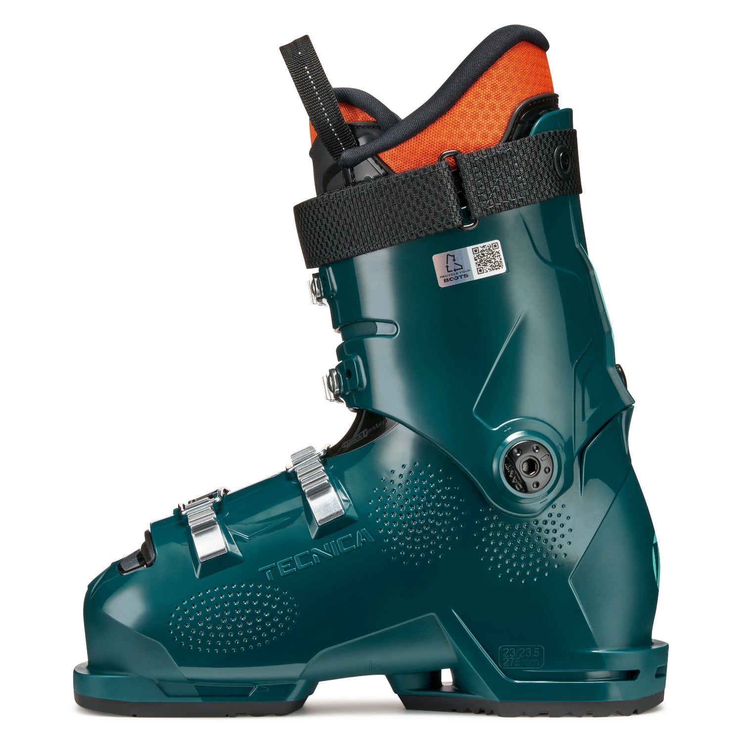 The medial side of a green ski boot with orange interior on a white background