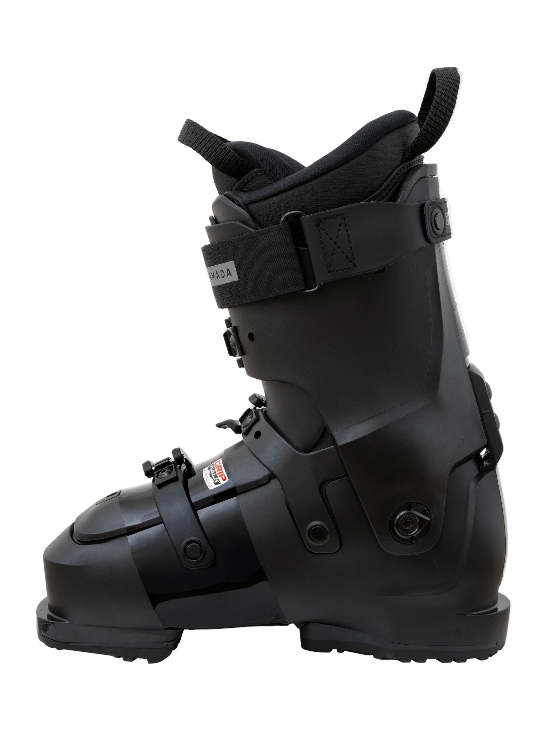 The medial side of a black ski boot on a light gray background