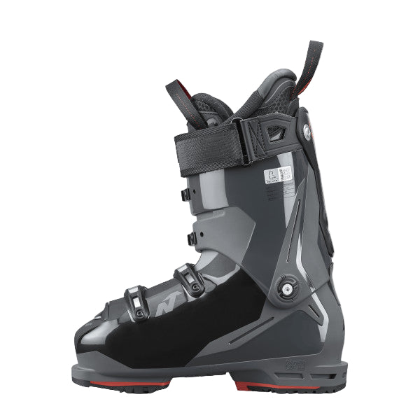 the inner part of the ski boot show more shades of grey and a rivet that hinges the top and bottom cuff.