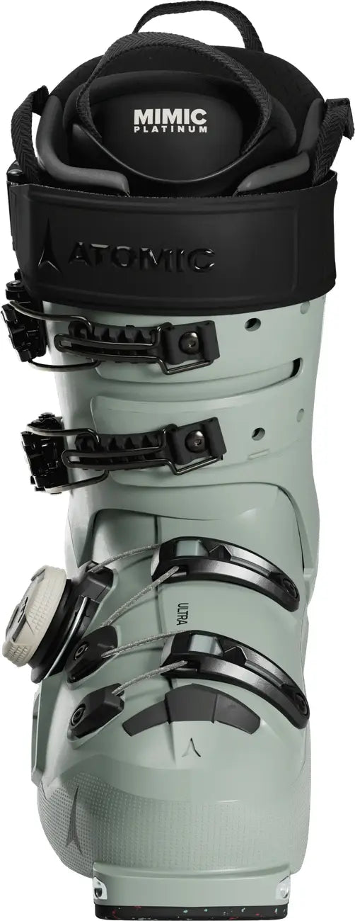 Women's hybrid ski boot with 'Atomic' branding on a white background.