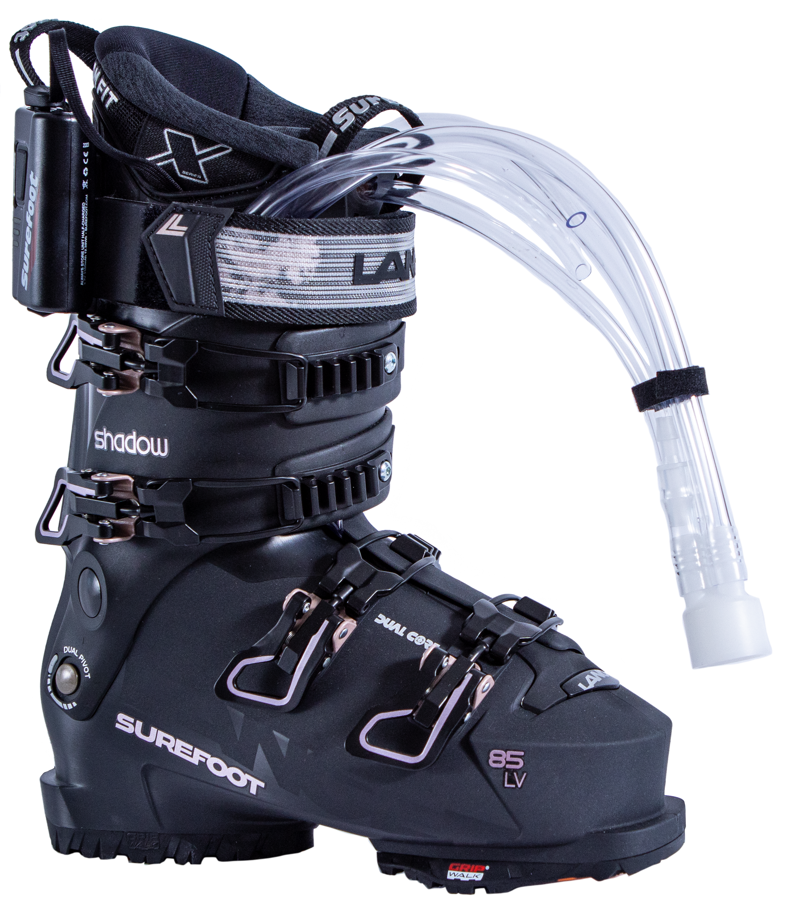 Surefoot Lange Shadow 85 LV matte black ski boot shell with light pink accents on buckles and Lange logo in black on power strap, Surefoot logo in light pink. Plastic tubes coming out for Surefoot memory foam injection into shell lining. Winterheat ski boot heater attached to outside edge.