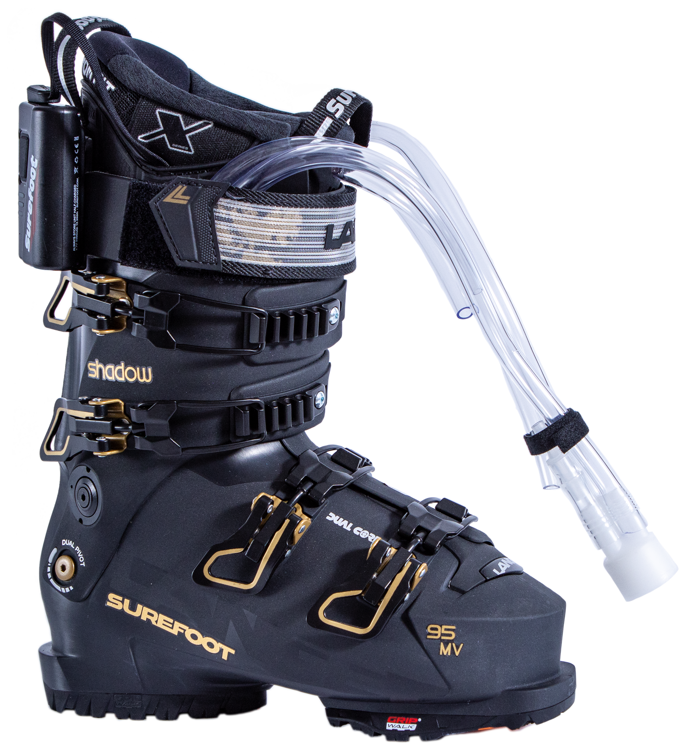 Surefoot Lange Shadow 95 MV matte black ski boot shell with gold accents on buckles and Lange logo in black on power strap, Surefoot logo in gold. Plastic tubes coming out for Surefoot memory foam injection into shell lining. Winterheat ski boot heater attached to outside edge.