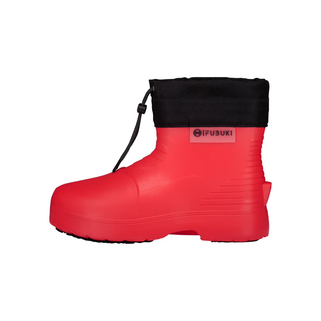 Red rubber boot with black cuff on a light gray background