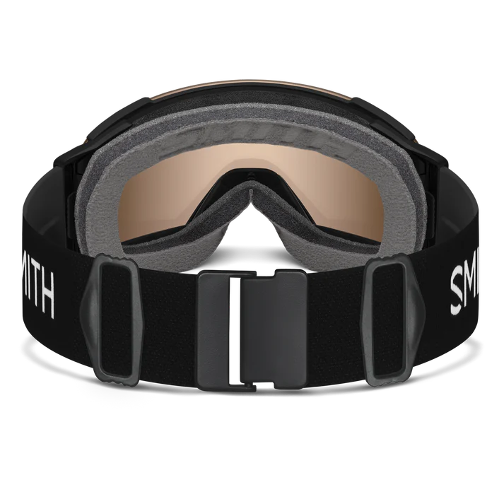 A view of the clip on teh back of a Smith ski goggle that makes it easy to put on.