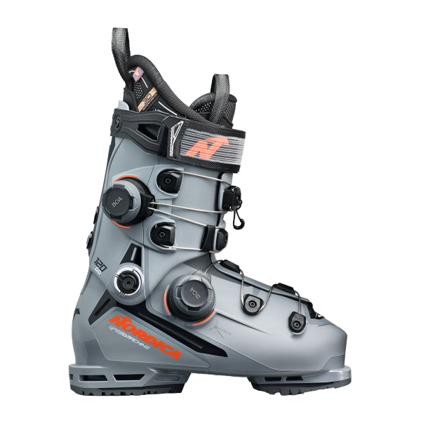 Gray ski boot with orange and black accents. this boot has  boa mechanism on the lower and upper shells.