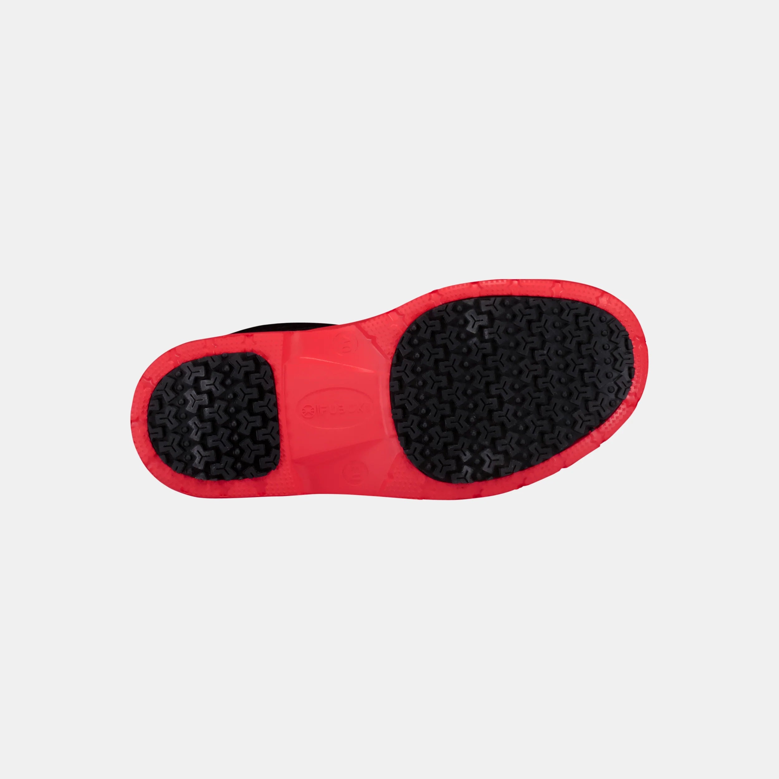 Red and black shoe sole on a light gray background